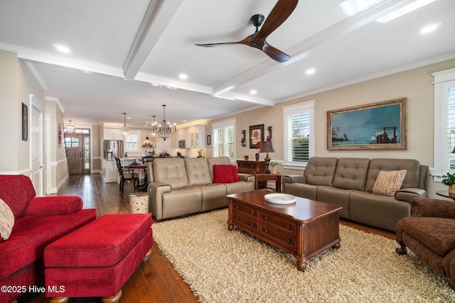 living room with crown molding, recessed lighting, wood-type flooring, and ceiling fan with notable chandelier