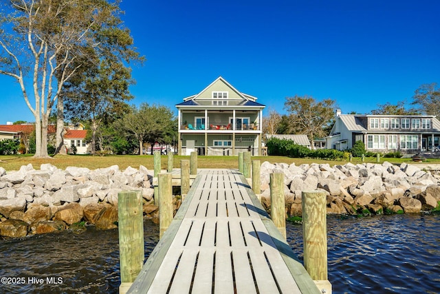 dock area featuring a water view