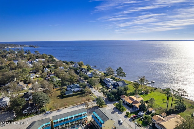 birds eye view of property with a water view and a residential view