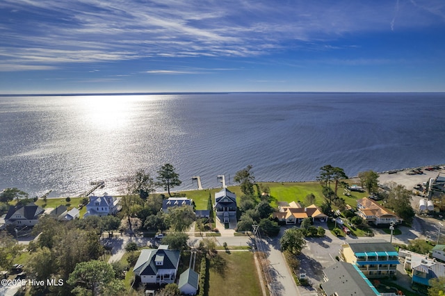 bird's eye view featuring a water view and a residential view