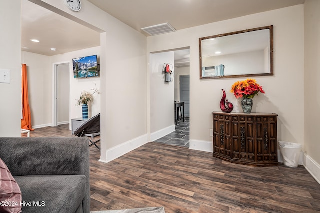 hall with dark wood-type flooring