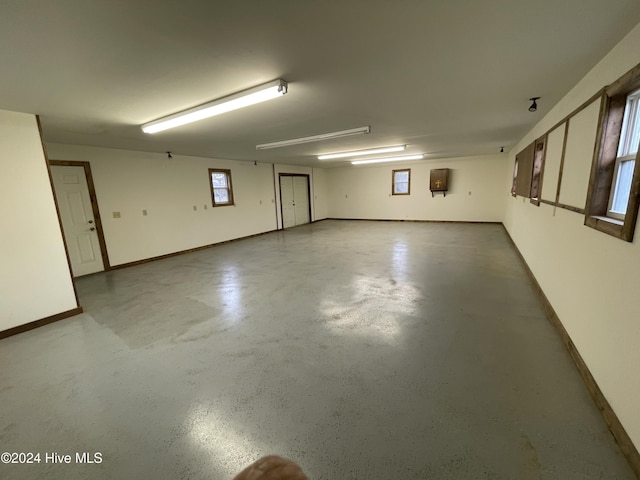 garage featuring baseboards