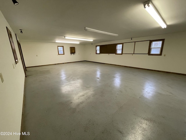 interior space featuring baseboards