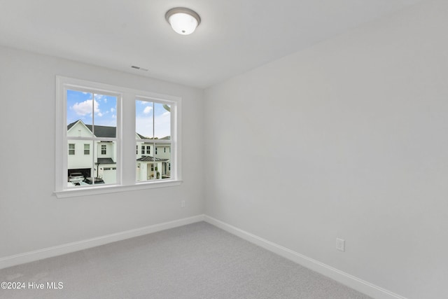 3146 Painted Turtle Loop Unit 12, Wilmington, NC 28409 - carpeted empty room with baseboards