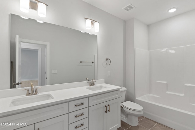 3146 Painted Turtle Loop Unit 12, Wilmington, NC 28409 - full bath featuring double vanity, tile patterned flooring, toilet, and bathing tub / shower combination