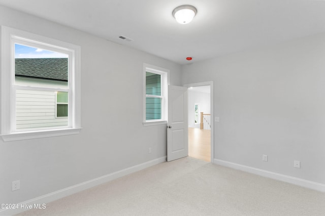 view of carpeted spare room