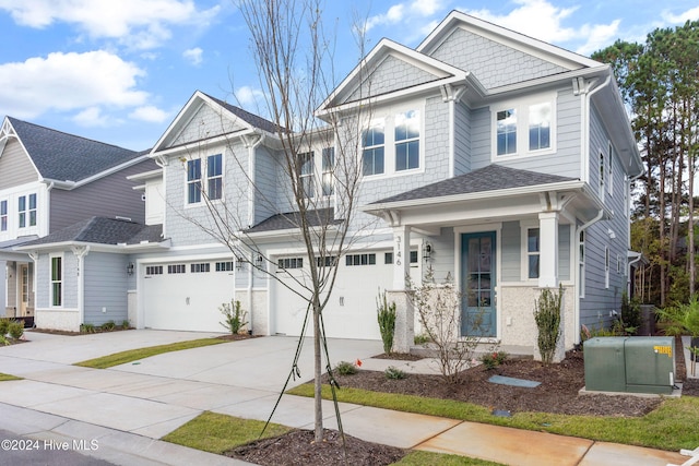 3146 Painted Turtle Loop Unit 12, Wilmington, NC 28409 - view of front of property featuring an attached garage and concrete driveway