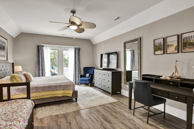 221 Seawatch Way, Kure Beach, NC 28449 - bedroom featuring lofted ceiling, wood finished floors, and ceiling fan