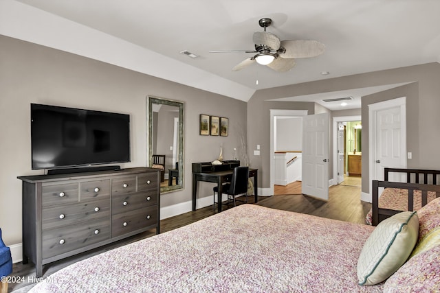 221 Seawatch Way, Kure Beach, NC 28449 - bedroom with dark wood-style floors, baseboards, vaulted ceiling, and a ceiling fan