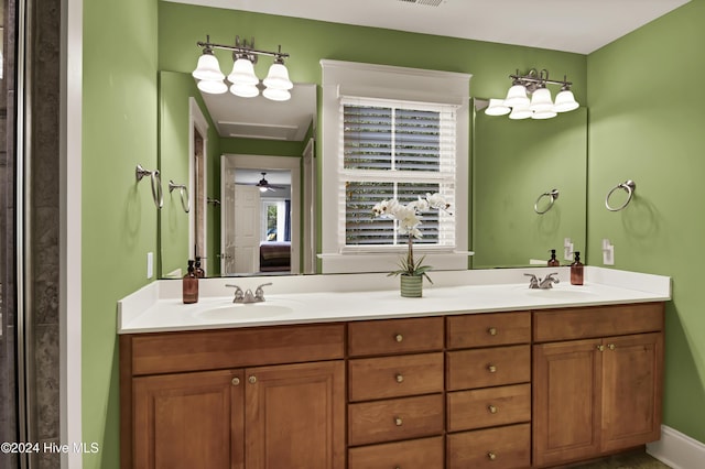 221 Seawatch Way, Kure Beach, NC 28449 - bathroom with double vanity and connected bathroom