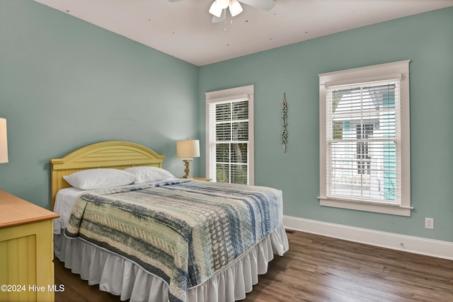 bedroom featuring hardwood / wood-style floors and ceiling fan