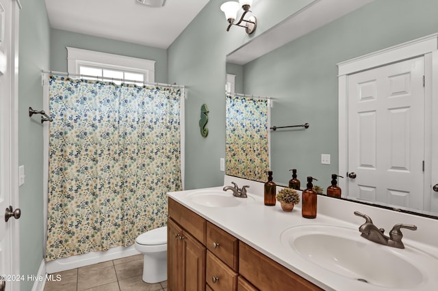 221 Seawatch Way, Kure Beach, NC 28449 - bathroom with double vanity, toilet, tile patterned floors, and shower / bath combination with curtain