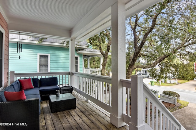 221 Seawatch Way, Kure Beach, NC 28449 - wooden porch with outdoor lounge area