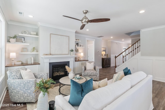 513 Moss Lake Ln, Holly Ridge, NC 28445 - living room featuring ceiling fan, visible vents, built in features, and wood finished floors