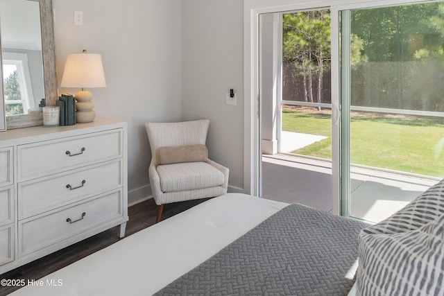 513 Moss Lake Ln, Holly Ridge, NC 28445 - bedroom featuring dark wood-style flooring and baseboards