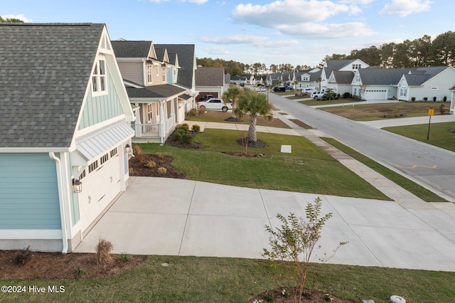 513 Moss Lake Ln, Holly Ridge, NC 28445 - view of road featuring a residential view