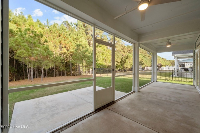 513 Moss Lake Ln, Holly Ridge, NC 28445 - unfurnished sunroom with ceiling fan
