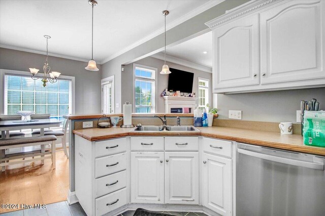 kitchen with white cabinets, sink, pendant lighting, dishwasher, and light hardwood / wood-style floors