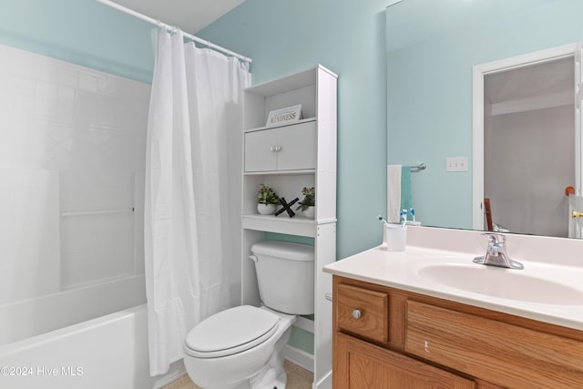 full bathroom with vanity, toilet, and shower / tub combo