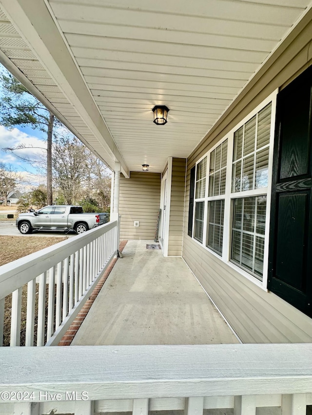 deck featuring covered porch