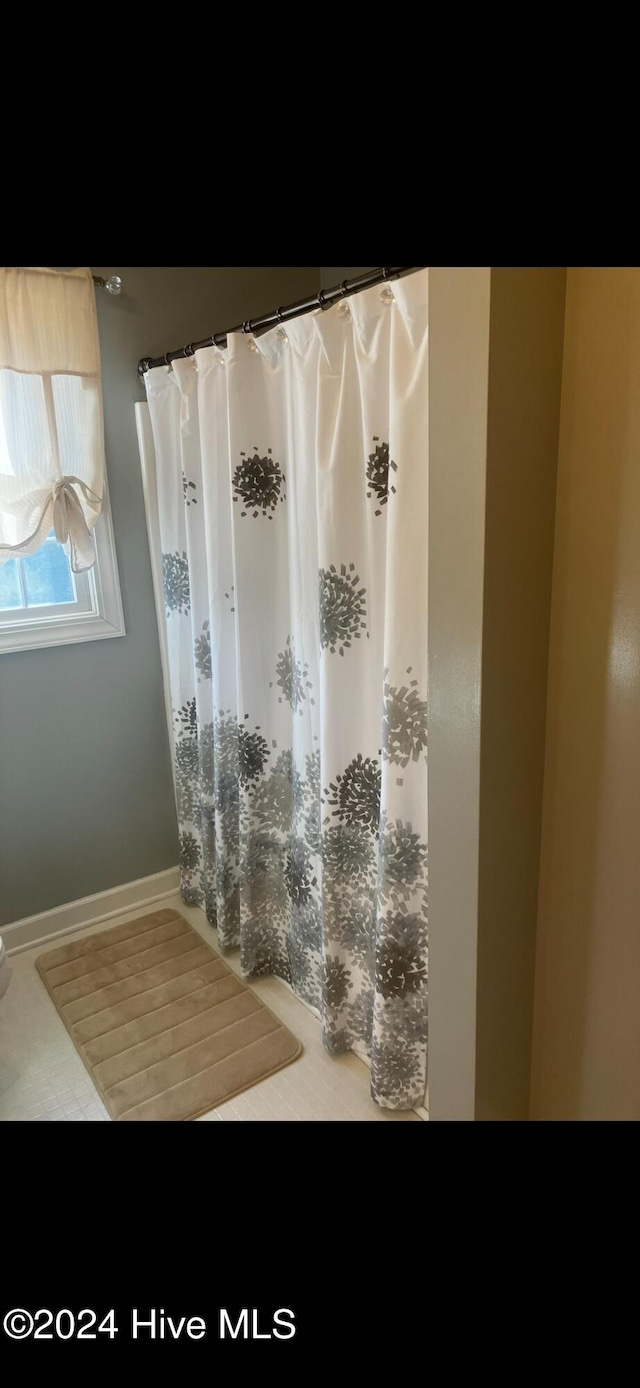 bathroom featuring tile patterned floors