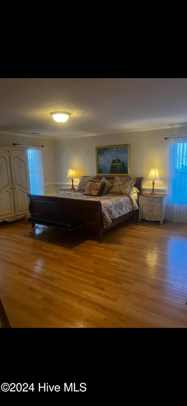 bedroom featuring light hardwood / wood-style floors