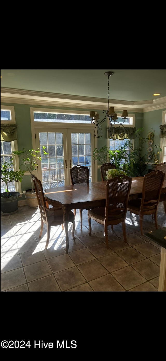 dining area featuring tile patterned flooring and french doors