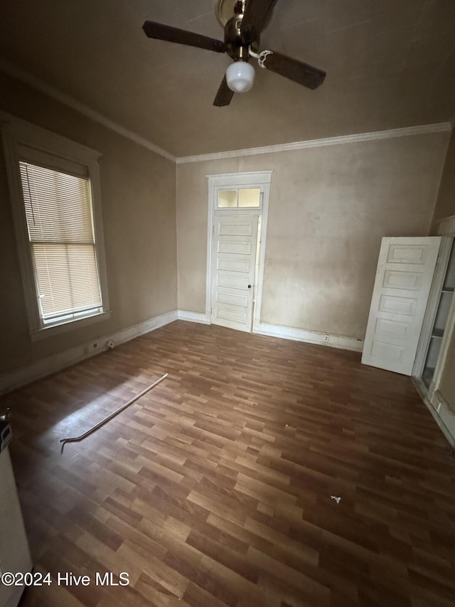 620 W Main St, Williamston, NC 27892 - empty room featuring a ceiling fan, ornamental molding, wood finished floors, and baseboards