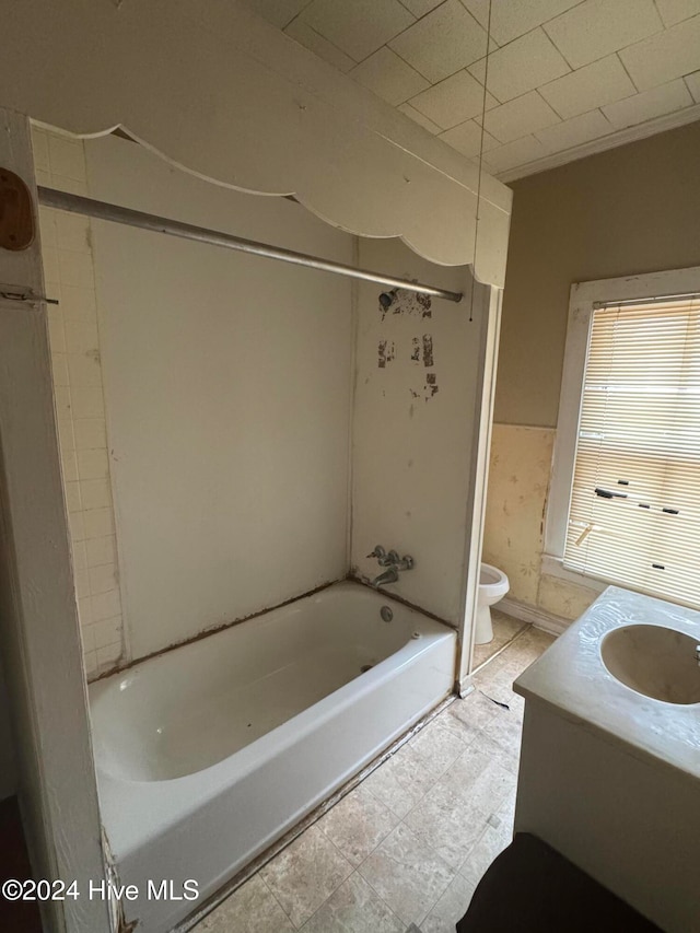 full bathroom featuring vanity,  shower combination, and toilet