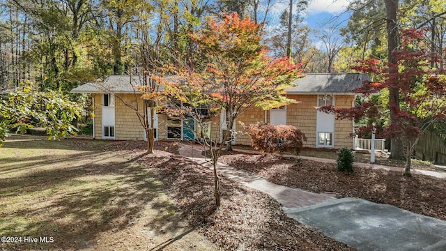 view of front of home with a front yard