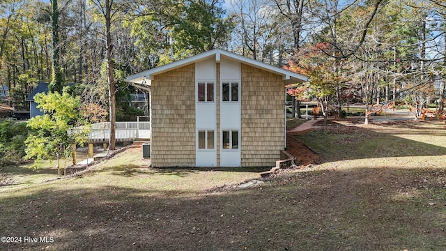 view of outdoor structure with central AC