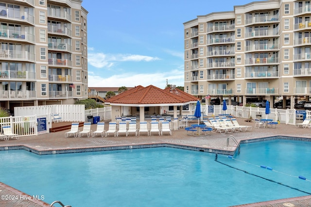 view of swimming pool with a gazebo