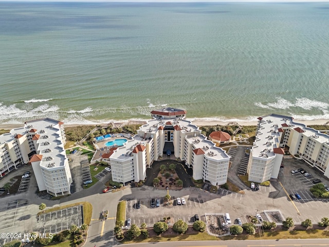 bird's eye view with a view of the beach and a water view