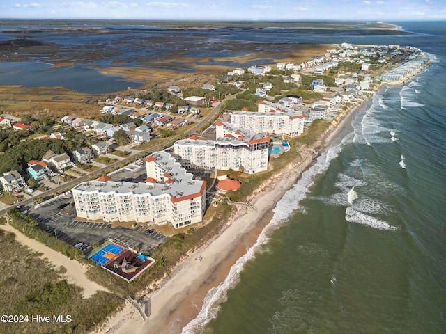 aerial view featuring a water view and a beach view