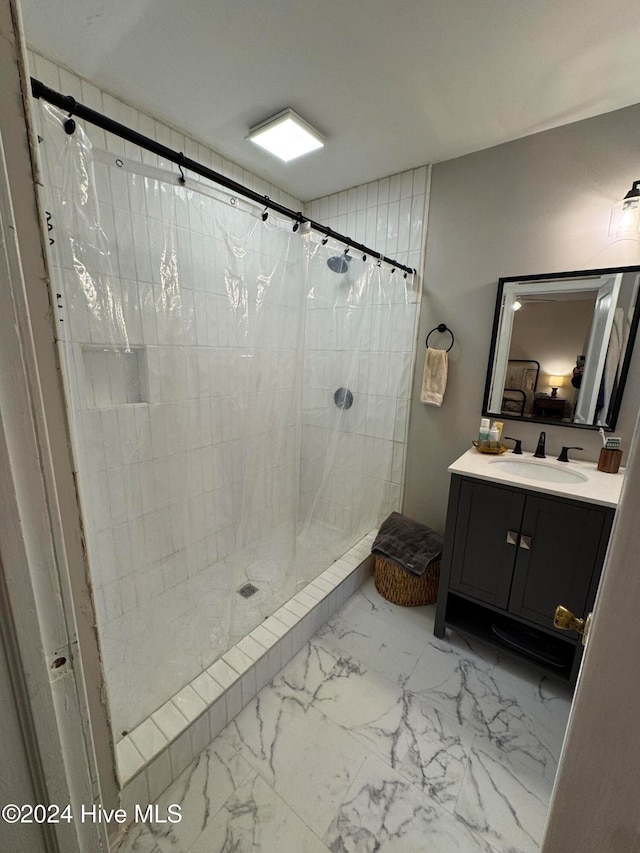 bathroom with a shower with curtain and vanity