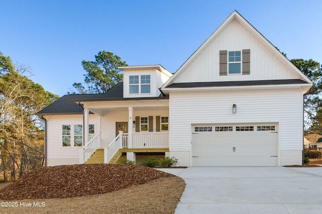 view of front of home featuring a garage and a porch