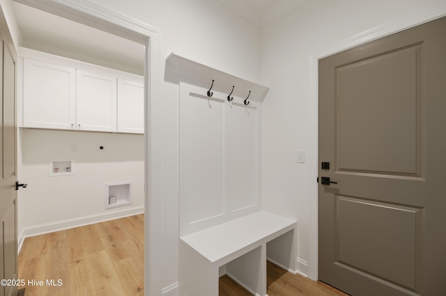 mudroom with light hardwood / wood-style floors