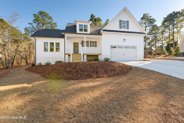 view of front facade featuring a garage and a porch