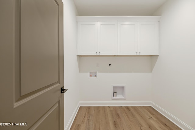 clothes washing area featuring hookup for a washing machine, cabinets, hookup for an electric dryer, and light wood-type flooring