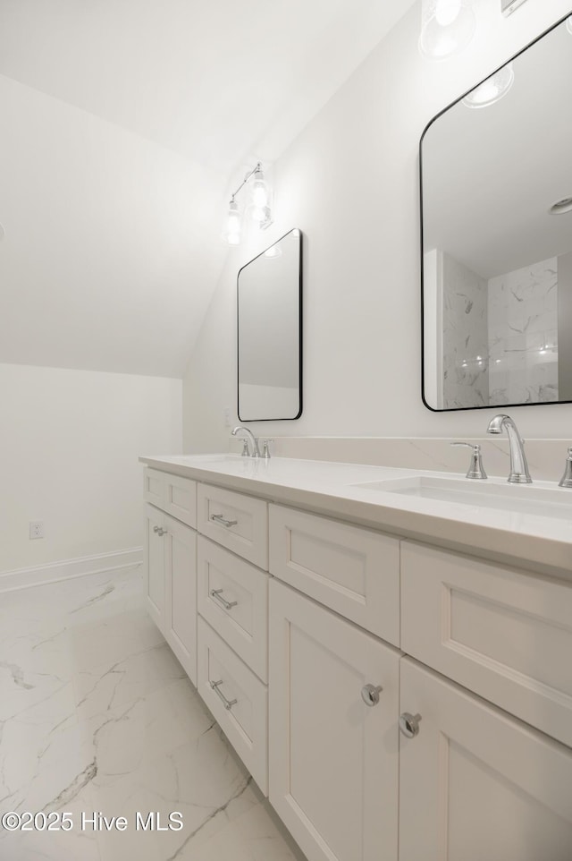 bathroom featuring lofted ceiling, walk in shower, and vanity