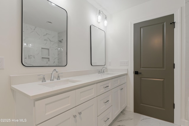 bathroom with a shower and vanity