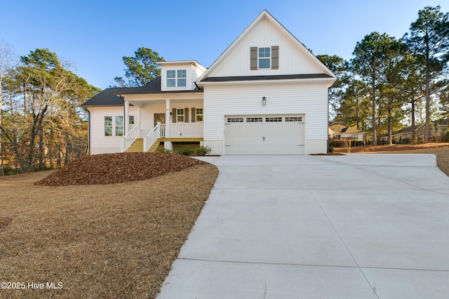 view of front of home featuring a garage and covered porch