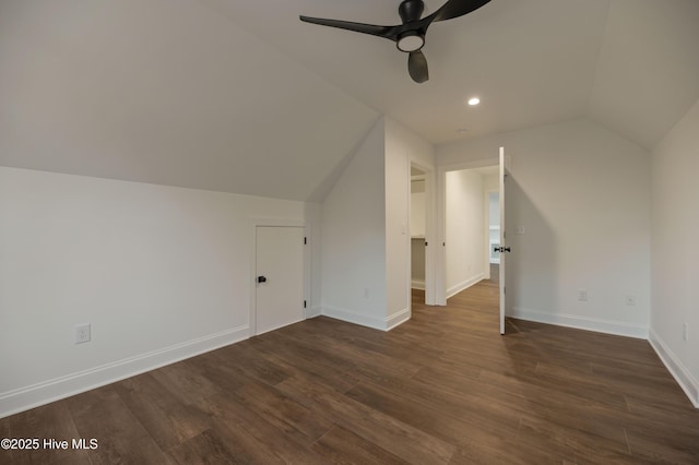 bonus room featuring ceiling fan, lofted ceiling, and dark hardwood / wood-style floors