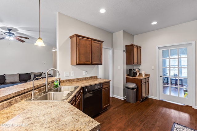 kitchen with dishwasher, sink, hanging light fixtures, dark hardwood / wood-style floors, and ceiling fan