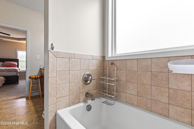 bathroom featuring a washtub