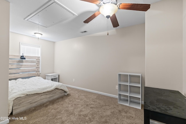 carpeted bedroom featuring ceiling fan