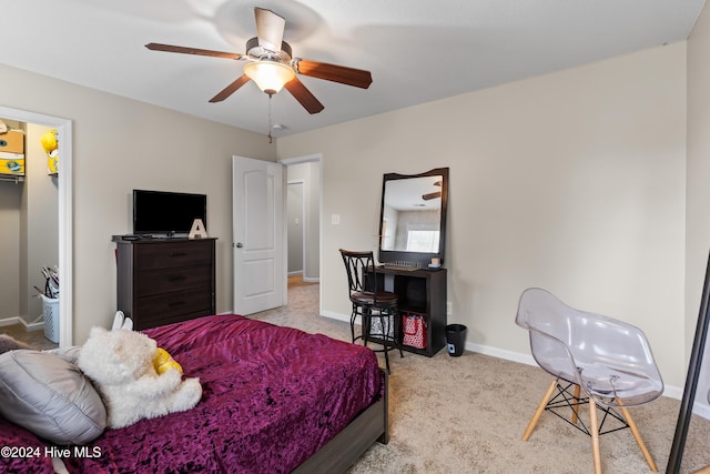 bedroom featuring ceiling fan and light colored carpet