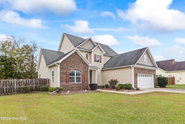 view of front of property featuring a garage and a front lawn