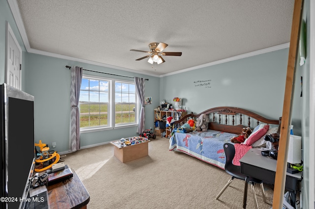 bedroom featuring carpet flooring, ceiling fan, a textured ceiling, and ornamental molding