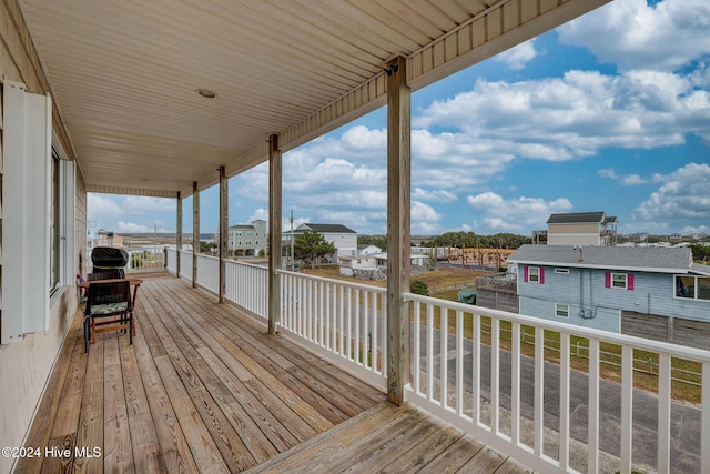 132 Reeves St, North Topsail Beach, NC 28460 - wooden terrace with a residential view